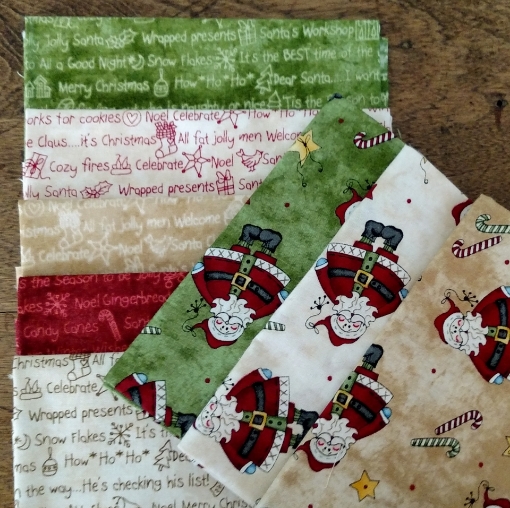 Picture of Tiny Santas & Christmas Words Stack of Christmas Fabrics