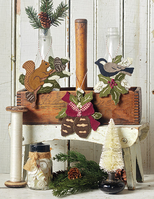 45 of Stacy West's popular Wool Applique Ornaments